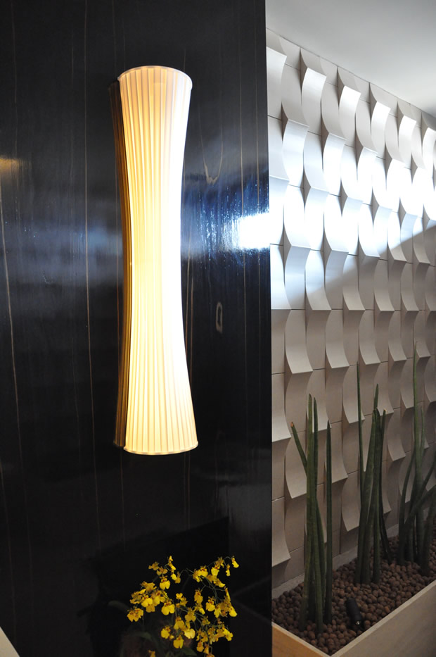 Amei essa parede e essa arandela modernas